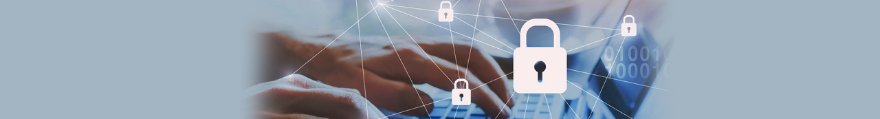 Close-up image of hands typing on a computer keyboard